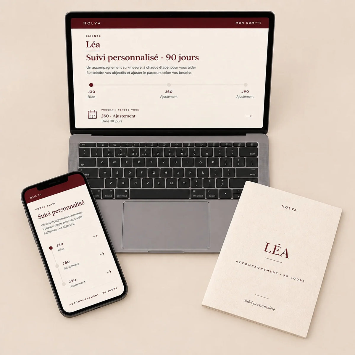 Espace client NOLYA avec ordinateur et téléphone pour le suivi personnalisé 90 jours